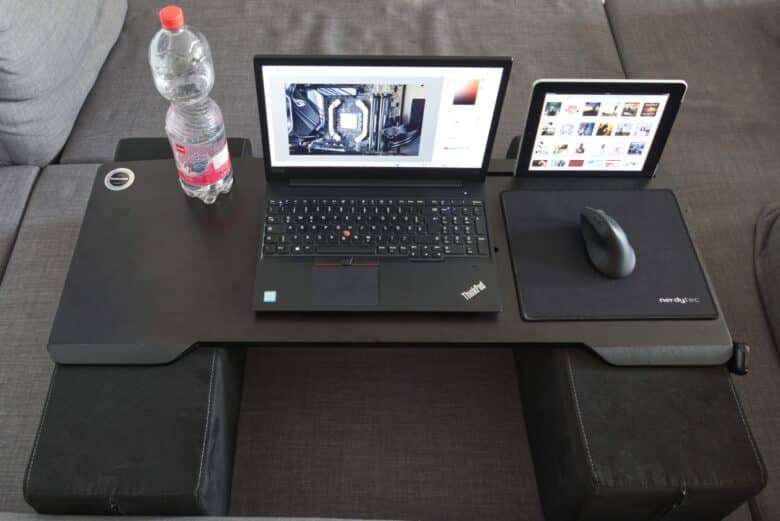Couchmaster Cyboss from diagonally above with laptop, bottle and tablet